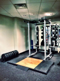 Rep1 Fitness personal trainer squat rack
